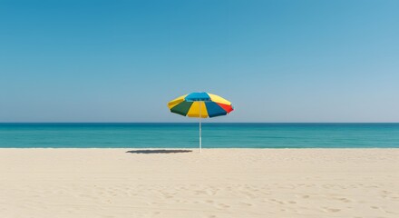 Colorful Beach Umbrella on Sandy Shore with Tranquil Ocean View
