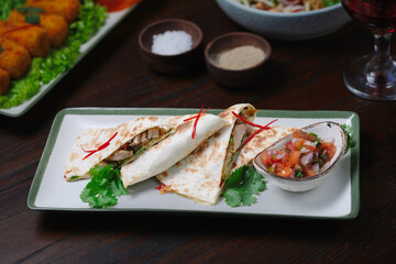 Grilled Chicken Quesadillas with Fresh Salsa and Herb Garnish