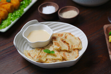 Flaky Roti with Sweet Condensed Milk Dipping Sauce