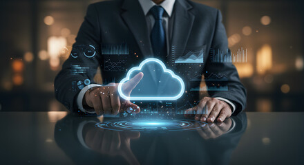 Businessman finger pressing glowing cloud icon, surrounded by floating data graphs and analytics