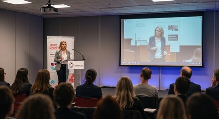 Businesswoman presenting ideas during a conference in a modern venue -  