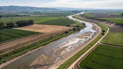 Aerial View of a River Meandering Through Agricultural Fields