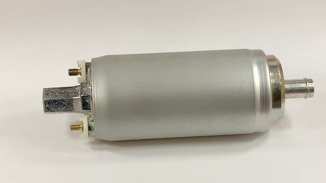 Automotive electric fuel pump for fuel injected vehicles