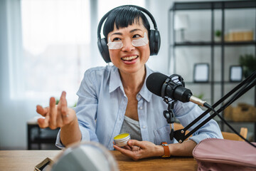 japanese woman hosts a show about skin care product at home studio