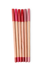 Lip pencils isolated on white, top view. Cosmetic products