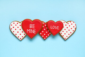 Sweet heart shaped cookies on blue background. Valentine's day celebration
