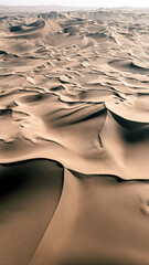The beautiful Kumtag Desert in Xinjiang from 500 meters shot from the drone