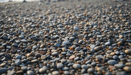 Obraz premium Smooth Stones: A Serene Seashore Pebble Field