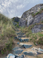 British country walk with stone steps leading into rocky hills