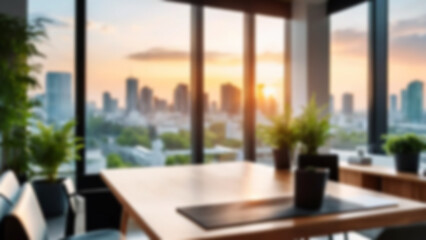 Blurred office interior background with large windows with city urban view, plants and wooden table at sunset. Modern workplace and green urban concept. Design for poster, wallpaper, Spate.