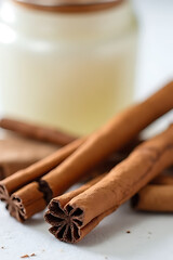 Cinnamon sticks culinary uses kitchen food photography warm natural environment close-up flavoring