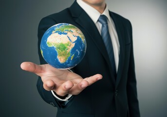 businessman with the world in his hand