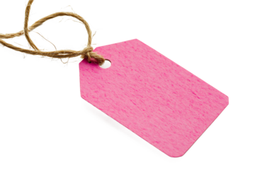 A close up of a pink tag with a string tied to it against a black color background image view