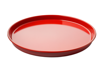 A close up shot of a shiny red circular tray with a raised edge on a black background studio shot
