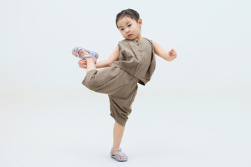 Cute Chinese little girl on white background