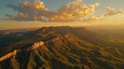 Majestic mountain range at golden sunset.