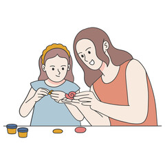 Mother playing clay with her daughter