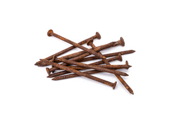 A pile of old nails full of rust that has never been used isolated on white background.