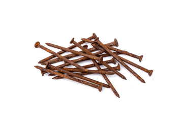 A pile of old nails full of rust that has never been used isolated on white background.