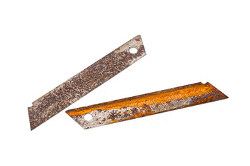Old used cutter blades that are full of rust isolated on white background.