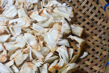Close up of a woman peeling cooking ingredients