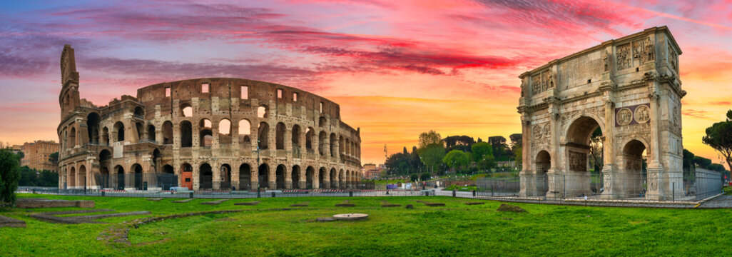 Colosseum and Constantine arch at sunrise in Rome, Italy 