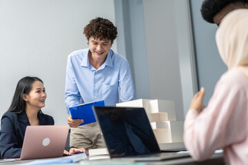 Diverse team brainstorming business meeting, professional presentation with data charts, team collaboration for project planning, modern corporate office teamwork, group discussing business strategies