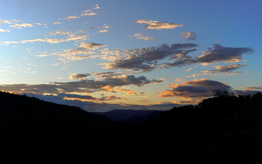 Sunset background. Dramatic majestic sunset landscape. Sky with clouds in the background of the light of the dawn sky. Sunset with clouds in various shapes. costa rica