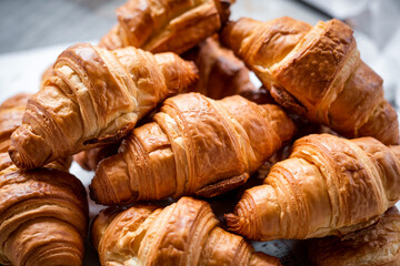 Freshly Baked Croissants Piled High Golden Brown And Delicious
