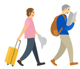 高齢夫婦がガイドを見ながら旅行中に散策