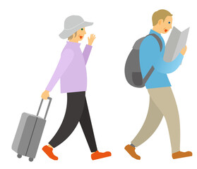 キャリーケースを持った旅行中の白人の観光客夫婦