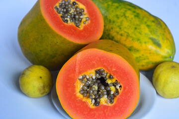 Papaya fruit (Carica papaya) in isolated white background, (papaya on white background)