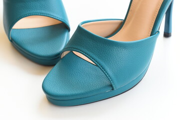green high heels shoes on white background