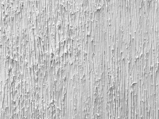 Decorative 3d white textured paint on a wall or panel. White paint with random stroke pattern, rough uneven surfaces. Suitable for bark, bump, paint, or graphic background. Seamless background texture