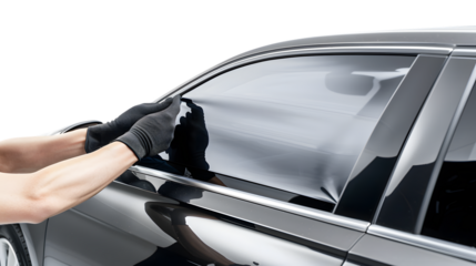 Professional Application of Tinting Foil on Car Window in Auto Service Shop