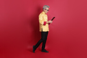 50s Asian Man in Changshan dress