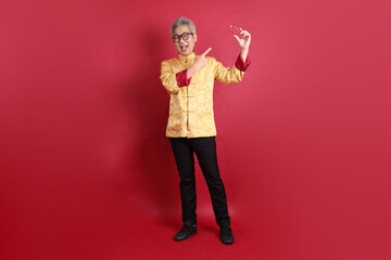 50s Asian Man in Changshan dress