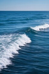 Fototapeta premium surfers are riding the waves in the ocean on a sunny day