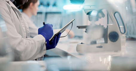 Hands, writing or scientist with tablet in laboratory for medical research, discovery or genes...