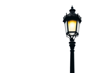 Vintage-inspired street lamp post in black metal design placed against a bright white background
