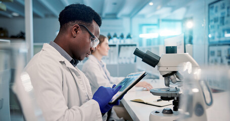 Biology, man or scientist on tablet to study in lab for medical research, discovery or genes...