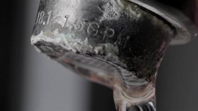 Plumbing Issue: Crusty Limescale on Tap Close Up
