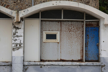 old abandoned warehouse with closed doors