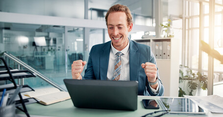 Fist pump, winner and business man on laptop for online bonus, stock market profits and finance success. Corporate, office and happy person celebrate on computer for investment, payment and promotion