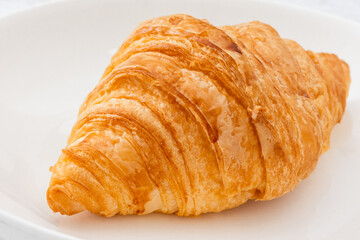 Croissant on plate