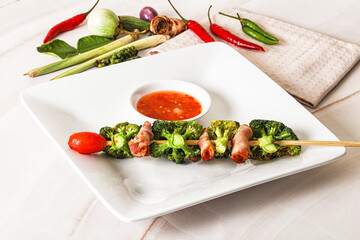 Thai Street foof satay with bacon and broccoli