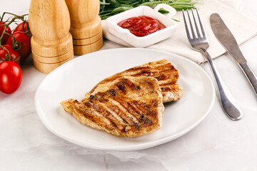 Grilled pork steak with sauce