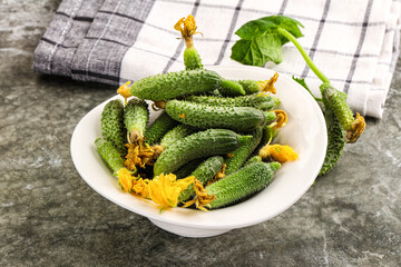 Raw gherkin cucumbers in the bowl