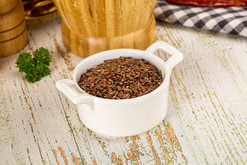 Brown flax seeds in the bowl