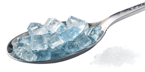 Sugar Crystals on Spoon: A spoonful of glistening, translucent sugar crystals sits against a backdrop of fine granulated sugar.